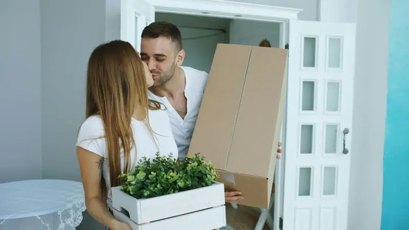 Couple moving into their new home with Relokates